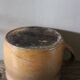 Round terracotta milk jug with handle