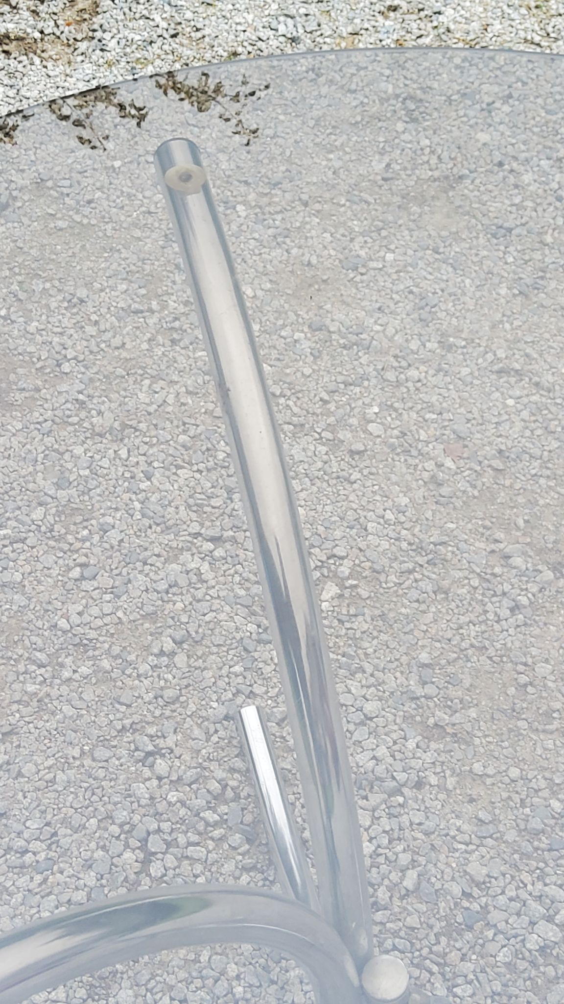 Dining table from the 70s top smoked glass base chrome