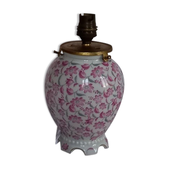 Antique porcelain lamp foot white background decorated with delicate pink flowers and gray foliage