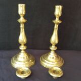Chiseled gilded metal candlesticks