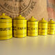 6 spice jars yellow and black enamelled sheet metal, fireplace pot