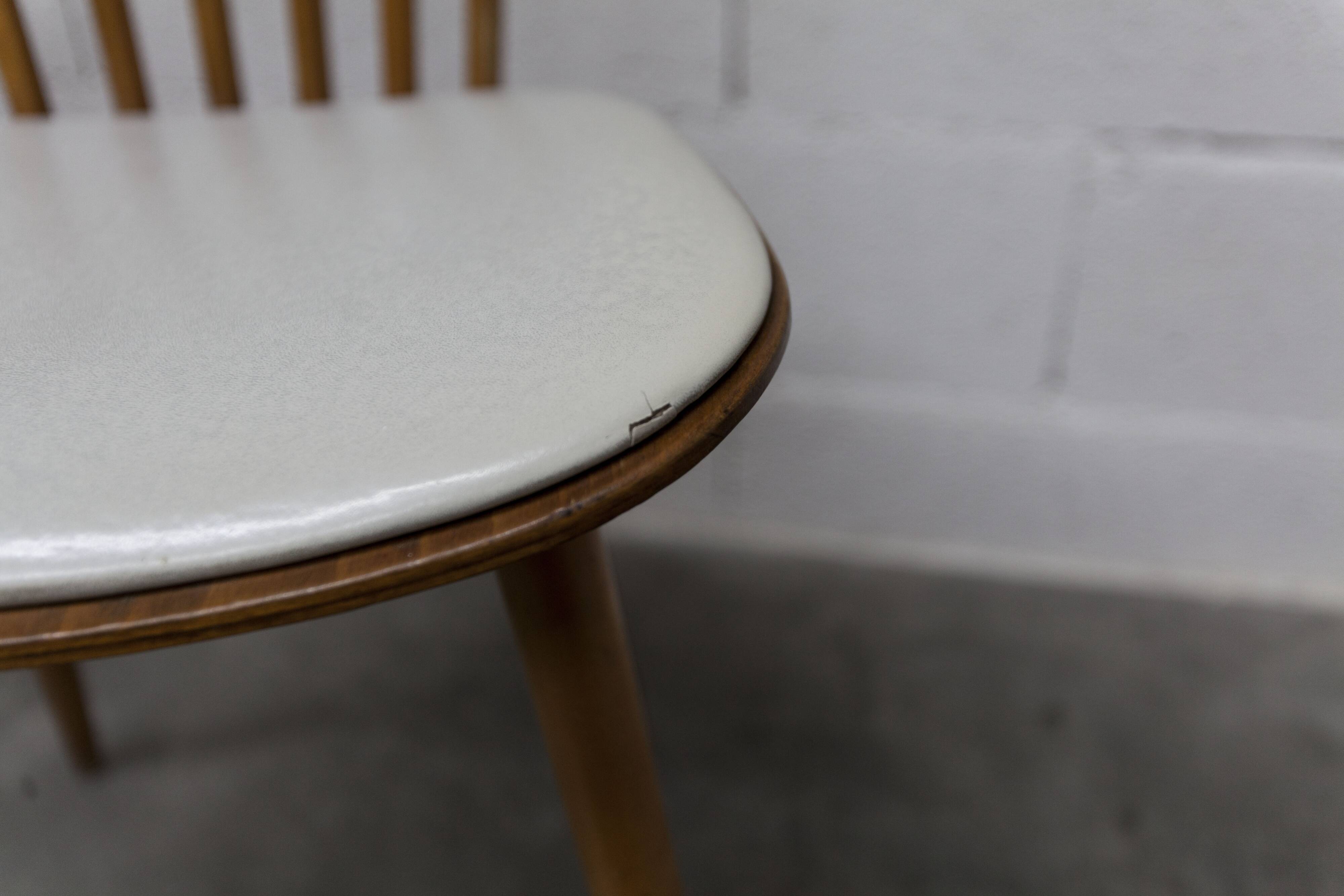 Pair of Baumann Menuet chairs, Honey patina, White vinyl seats