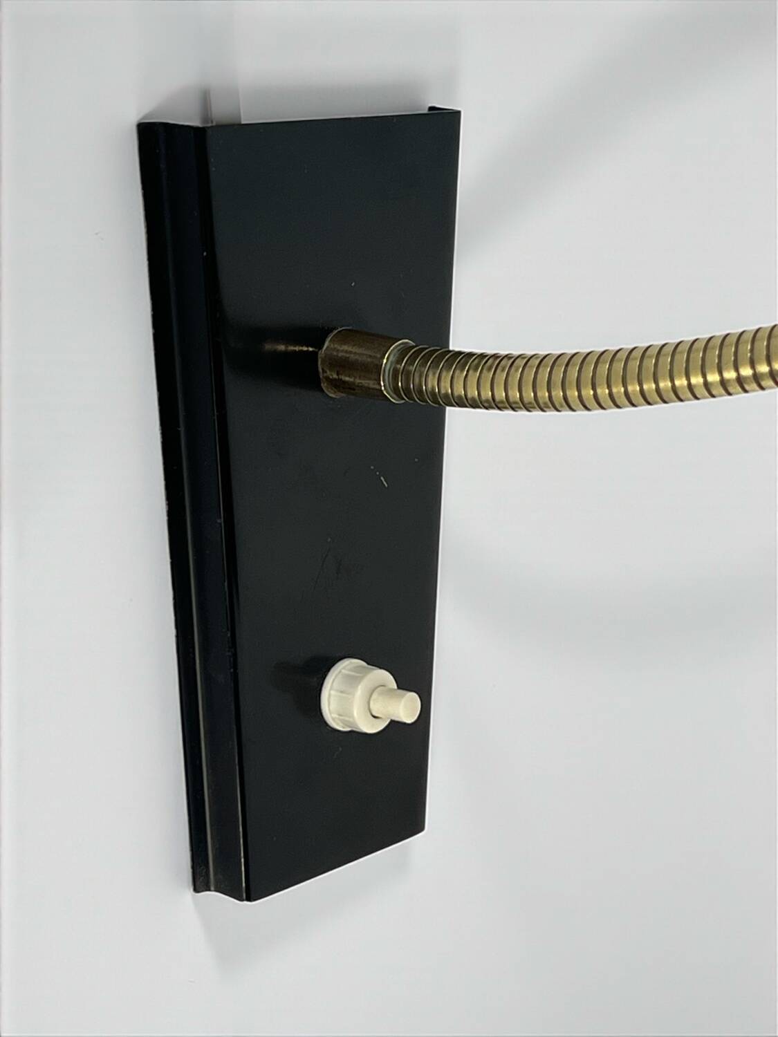 Vintage diabolo wall sconce in the style of René Mathieu