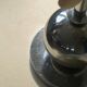 Art Deco table lamp with a mother-of-pearl top and Funkis-style frame.