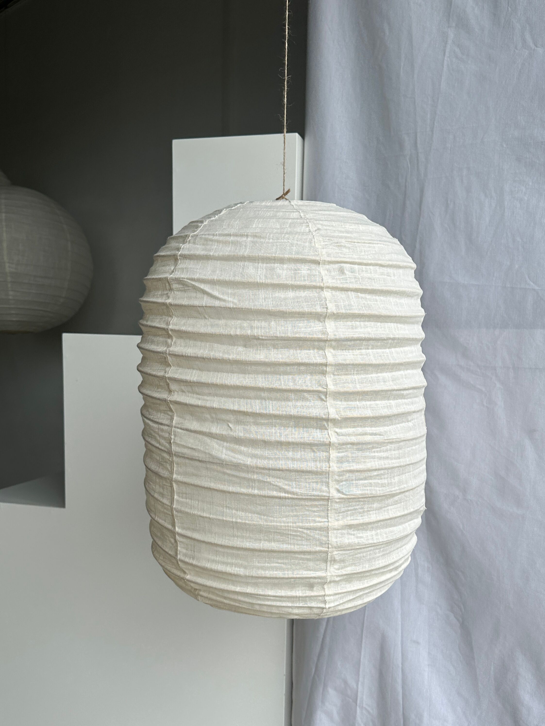 Suspension in rattan and natural japanese linen lantern shape h70 d50
