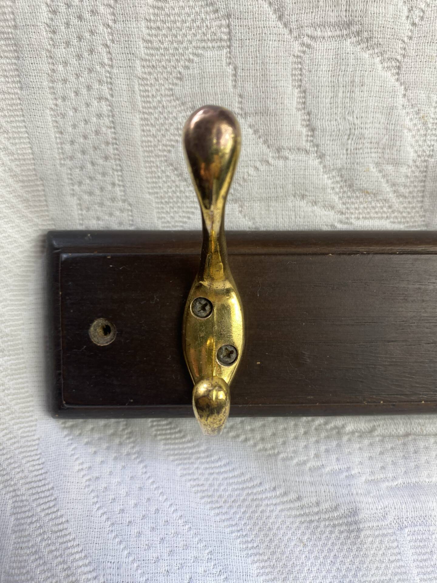 Wooden coat rack with double brass hooks