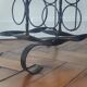 Side table, brutalist bottle holder in wrought iron and solid wood.