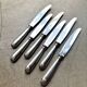 6 Christofle knives in silver-plated metal, shell design.