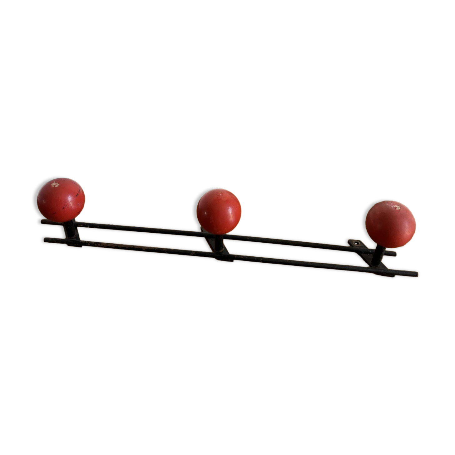 Coat rack with 3 red wooden balls