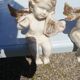 Pair of sitting angel statuettes