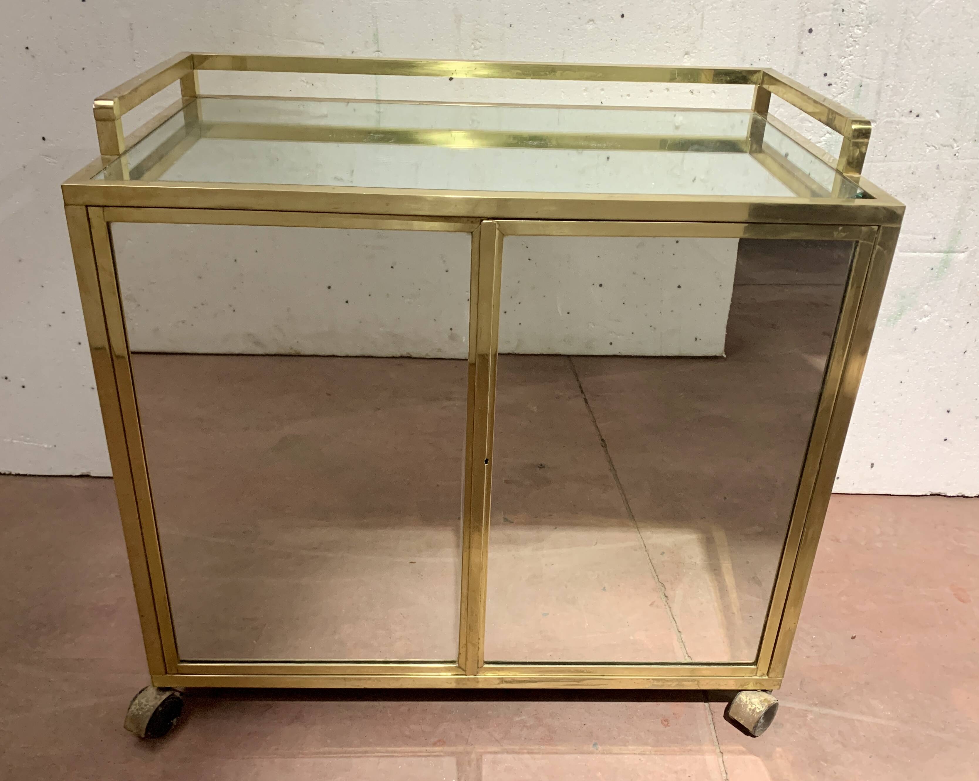 1970s brass bar with a mirrored front from the 20th century.