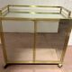 1970s brass bar with a mirrored front from the 20th century.