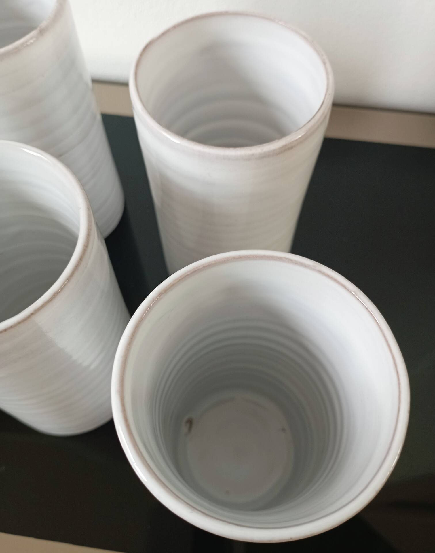 4 vintage stoneware cups in white