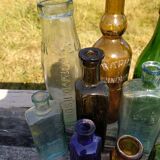 Set of old bottles colored glass
