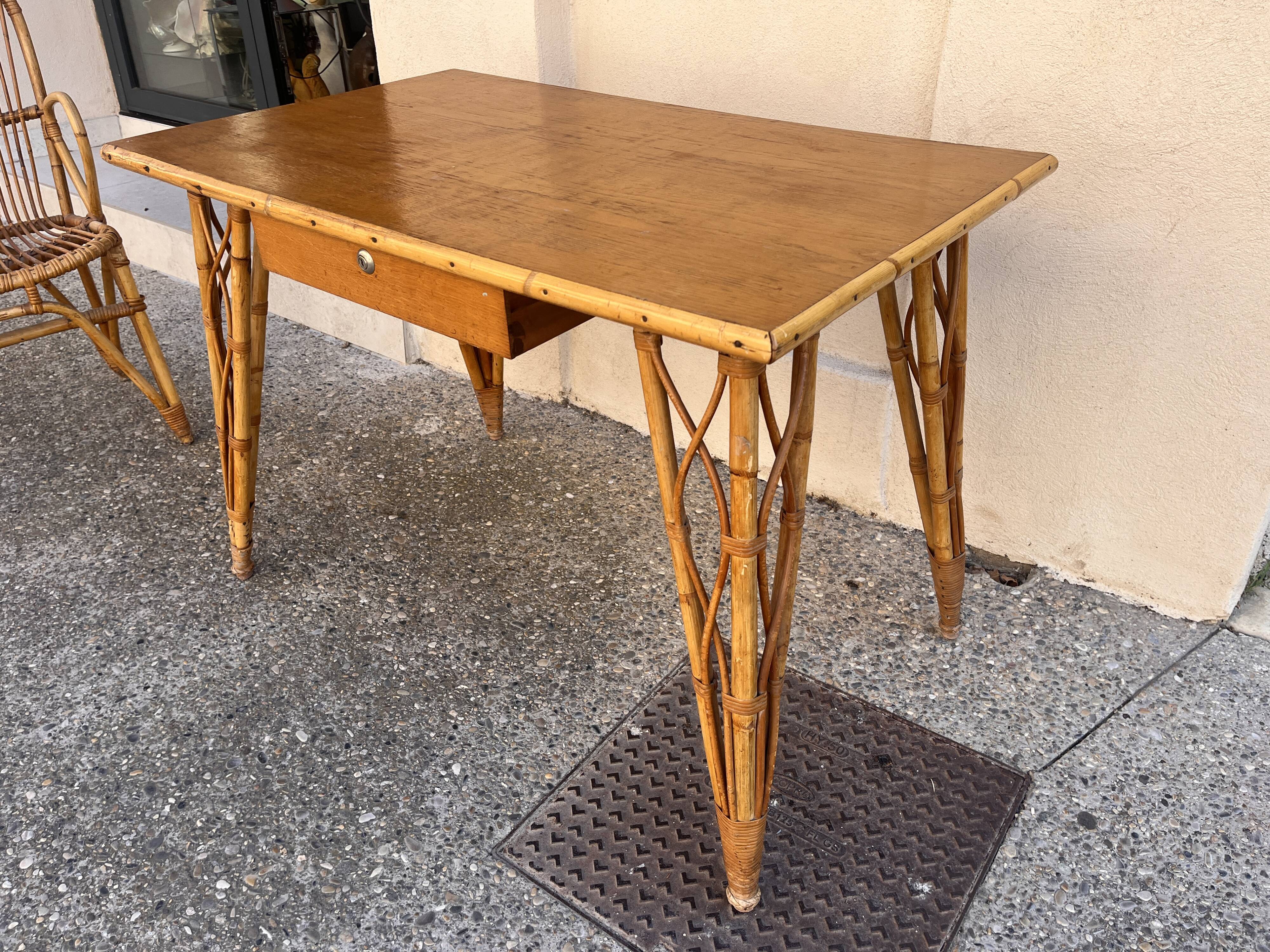vintage 1960s rattan desk with Eiffel Tower legs
