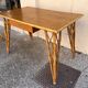 vintage 1960s rattan desk with Eiffel Tower legs