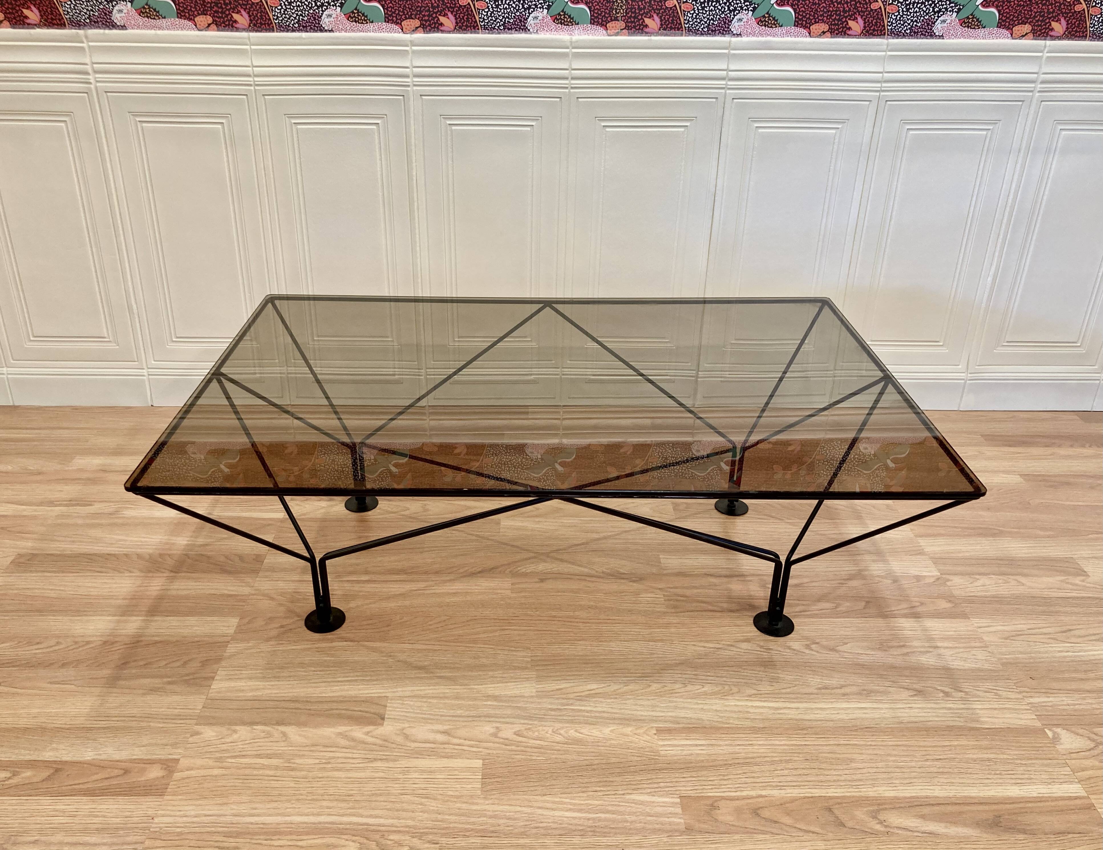 Designer glass and metal coffee table.