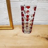 Glass vase with colored facets