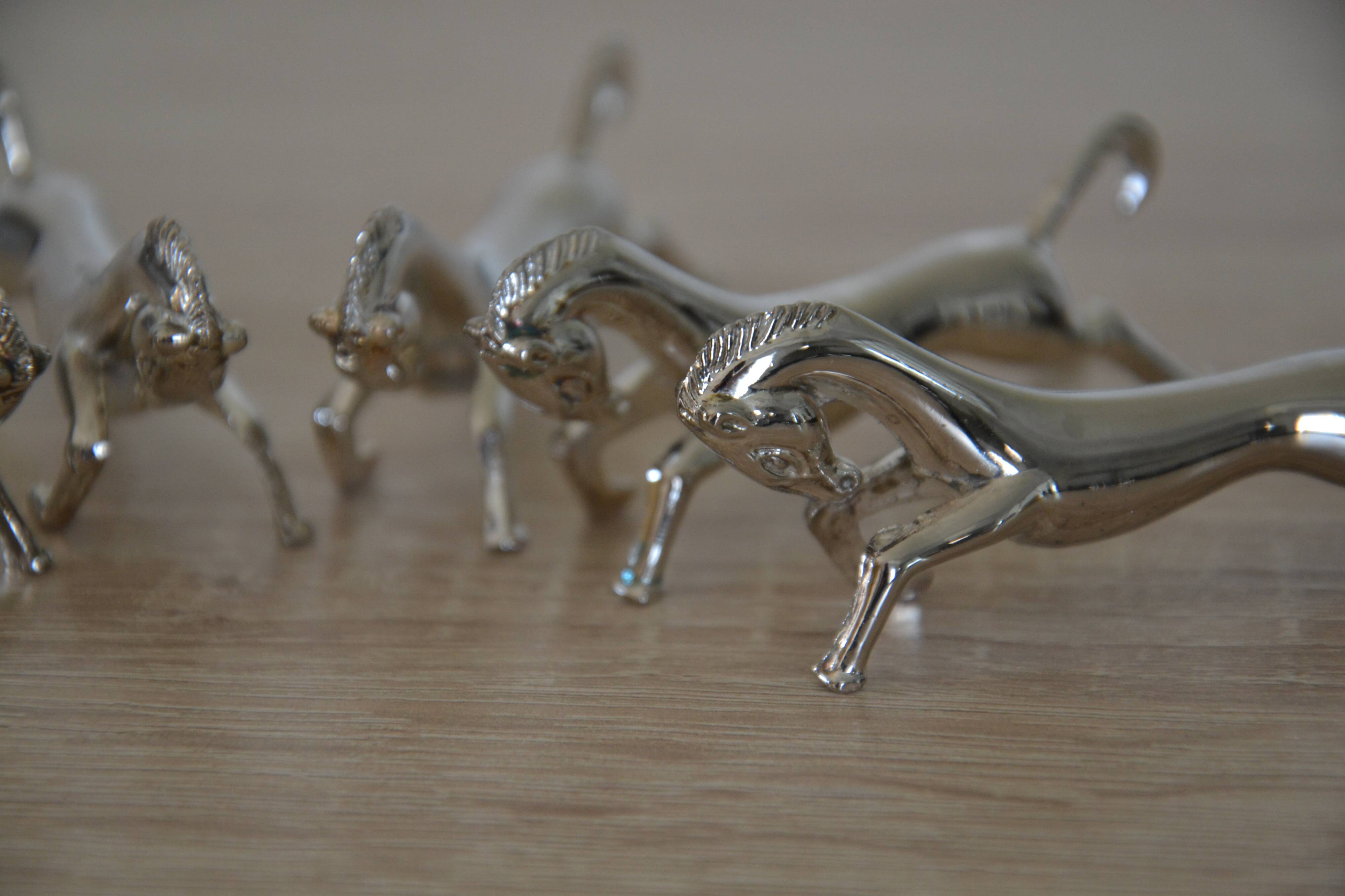6 silver-plated "horse" knife rests