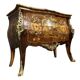 Commode sauteuse galbée style Louis XV estampillée en marqueterie