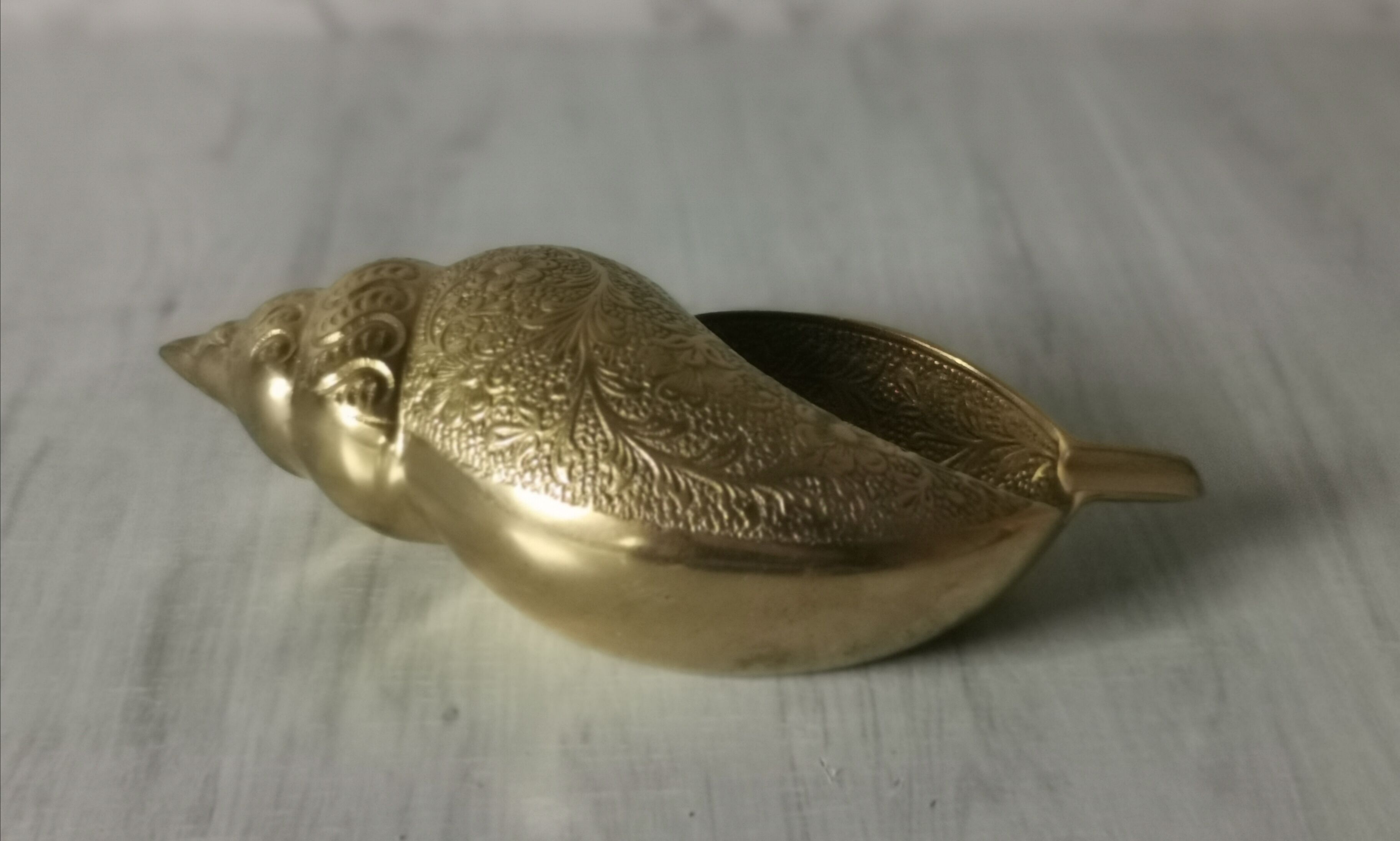 Brass shell ashtray