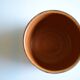 Ceramic cache pot or pocket emptying dish with a signature fish to identify.