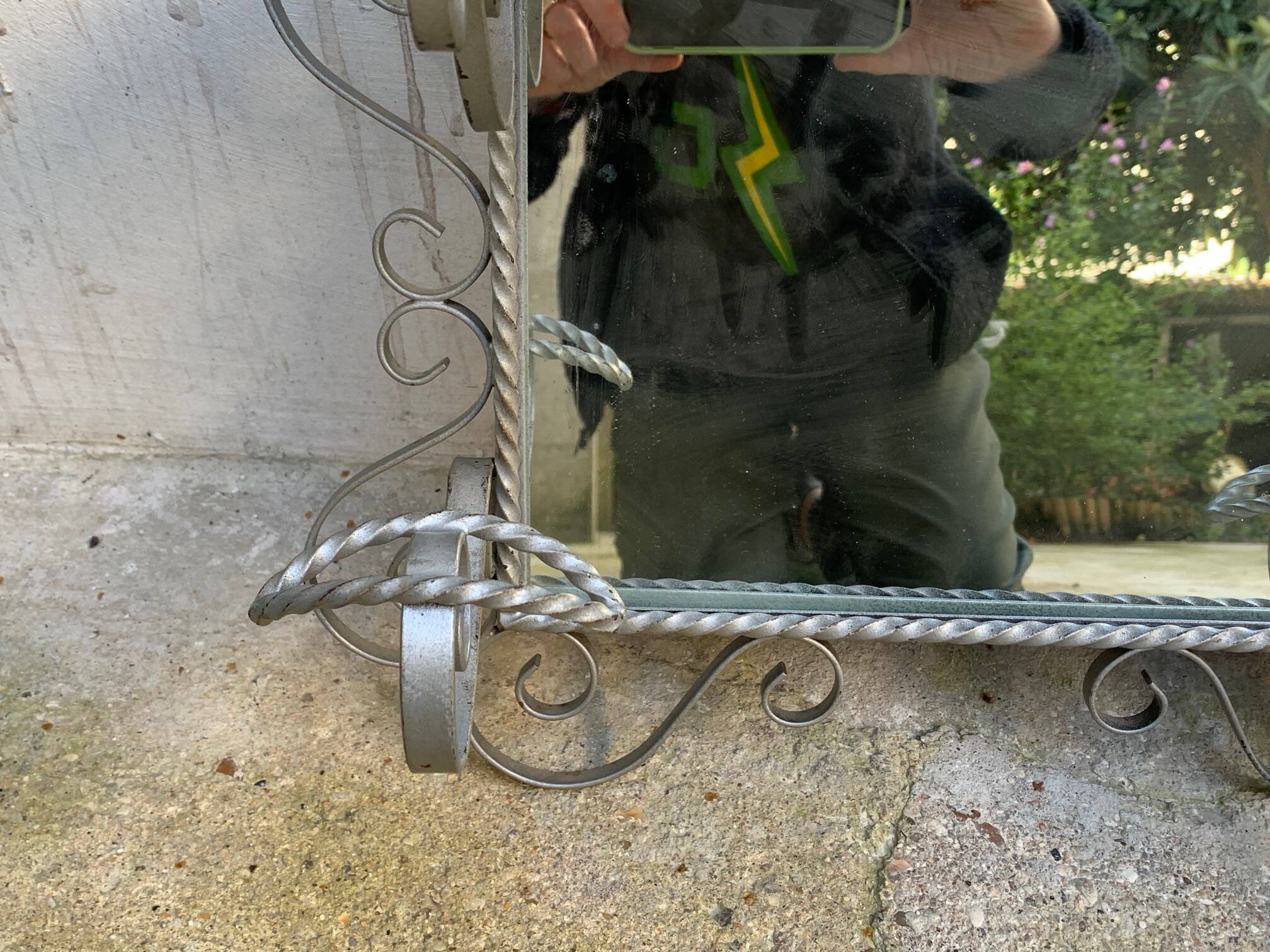 Wall coat rack, wrought iron hook with vintage mirror.