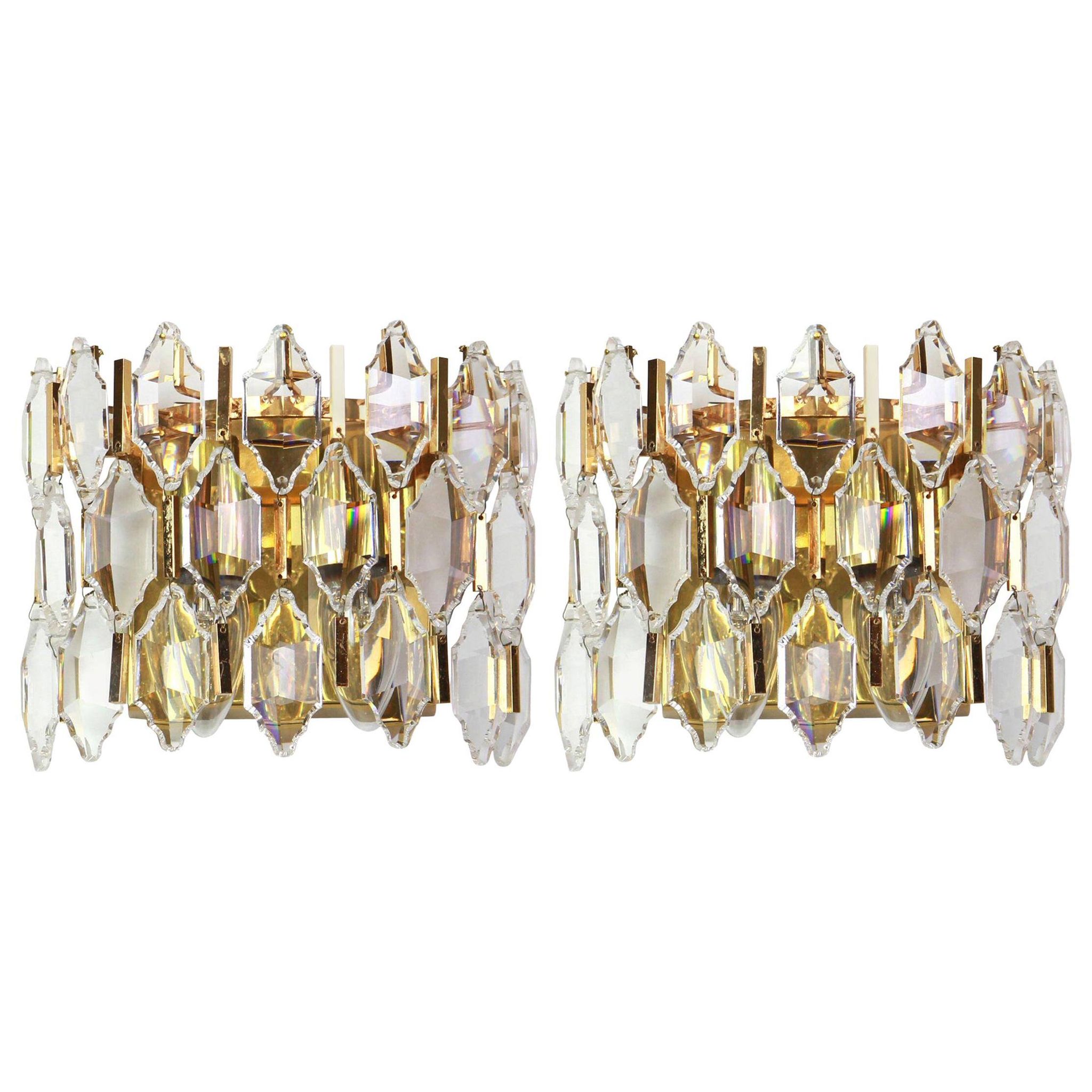 Pair of wall sconces in gilded brass and crystal by Palwa, Germany, 1970s.