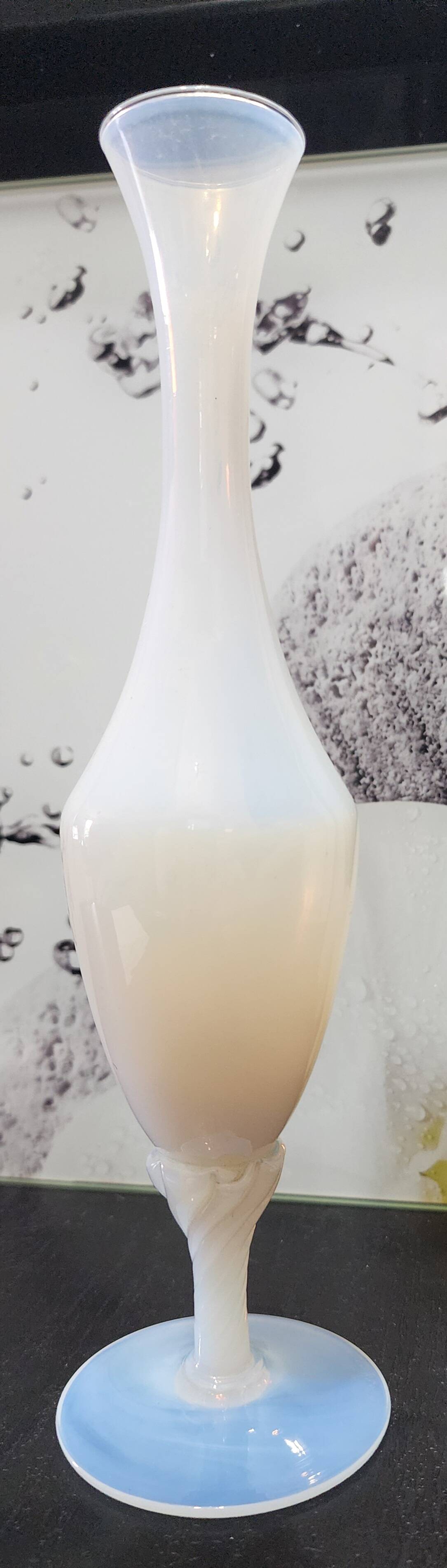 Vintage white opaline soliflore vase with blue reflections and twisted foot.