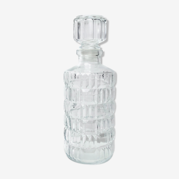 Beautiful detailed glass bottle of perfume/cotton