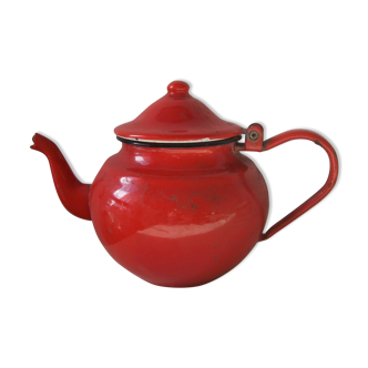 Red enamelled metal teapot