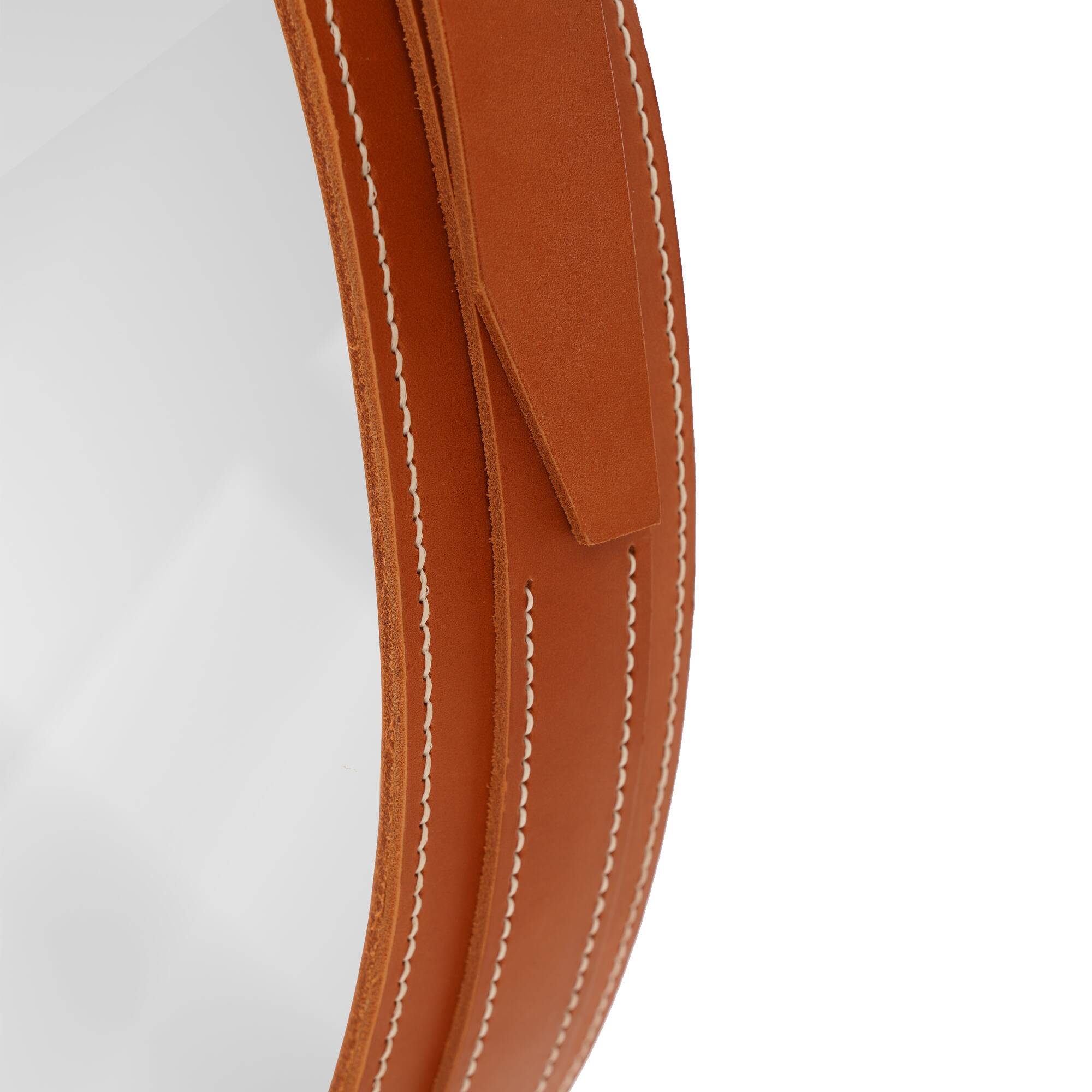 Handmade mirror in J. Adnet style, made of vegetable-tanned leather in tan colour, ø 45 cm.