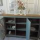 English sideboard, shallow, smoky green, wooden top.