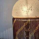 Lampe en laiton et perles, style charleston
