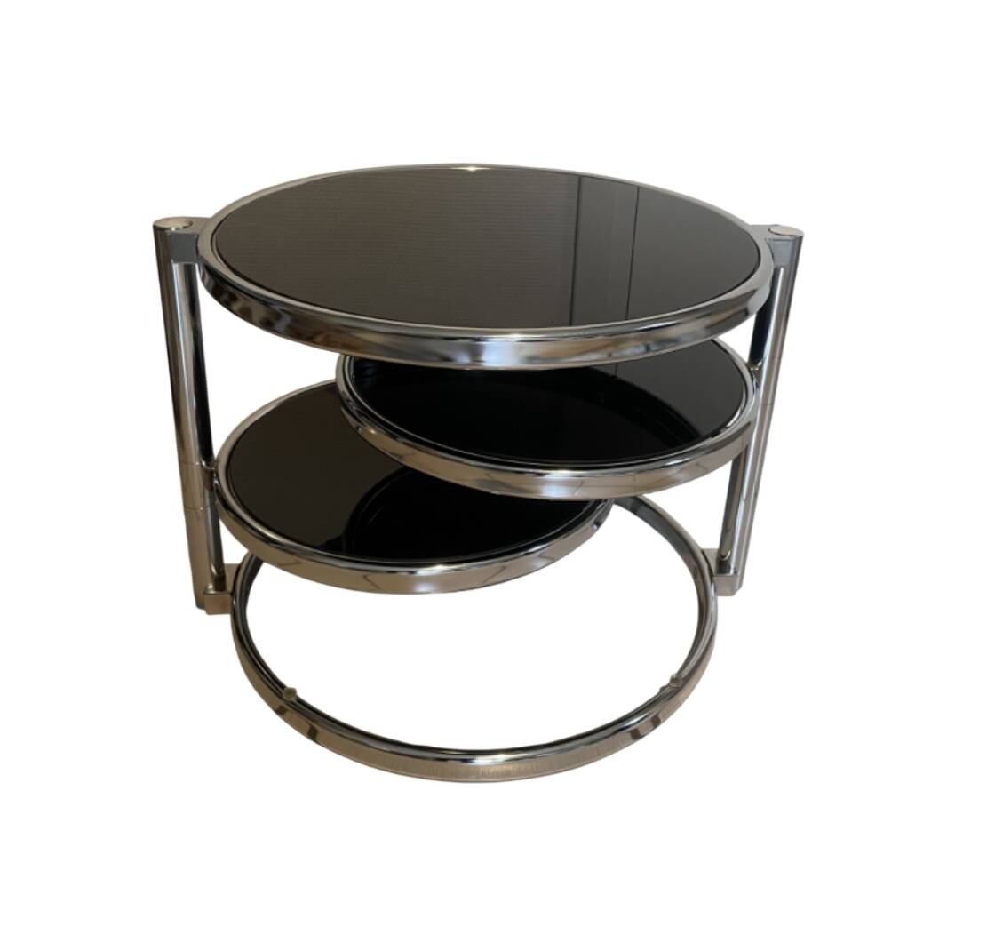 Coffee table with 3 chrome and smoked glass tops.