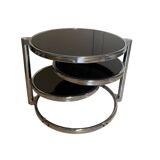 Coffee table with 3 chrome and smoked glass tops.