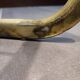 Tubular metal chair covered with gilding