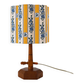 Vintage table lamp, turned wooden base from the 1950s and printed shade.