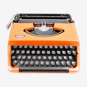 Typewriter Brother 210 orange vintage revised with new Ribbon