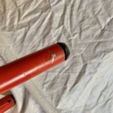 Vintage folding chair in red painted metal and wood