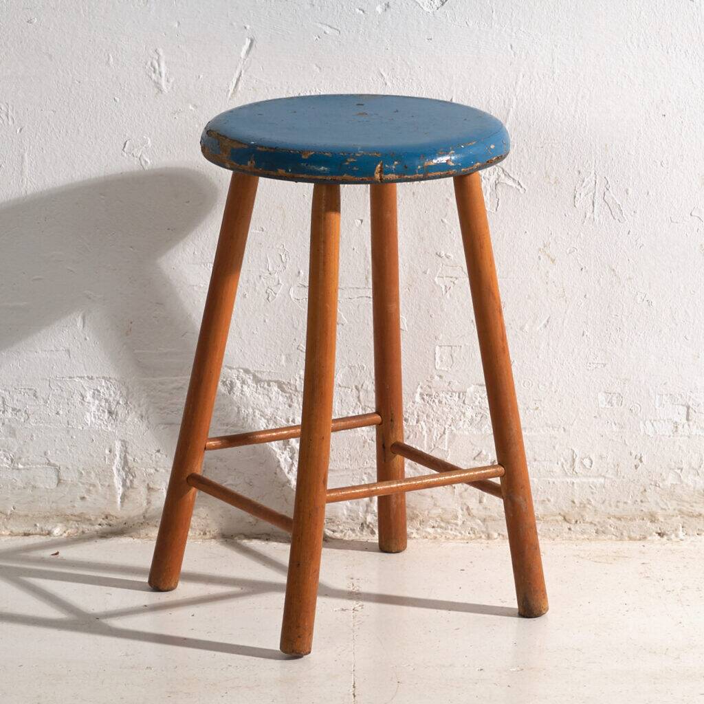 Antique wooden stool with a round seat – Central Europe, around 1950