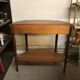 Cherry half-moon console with drawer and bottom shelf