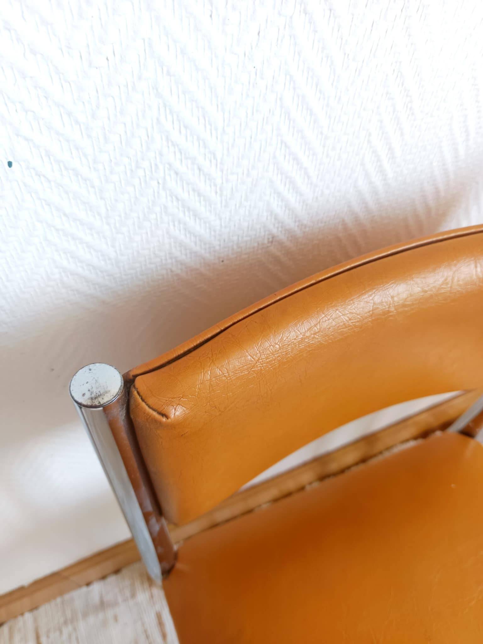Pair of vintage leatherette and chrome chairs from the 1970s