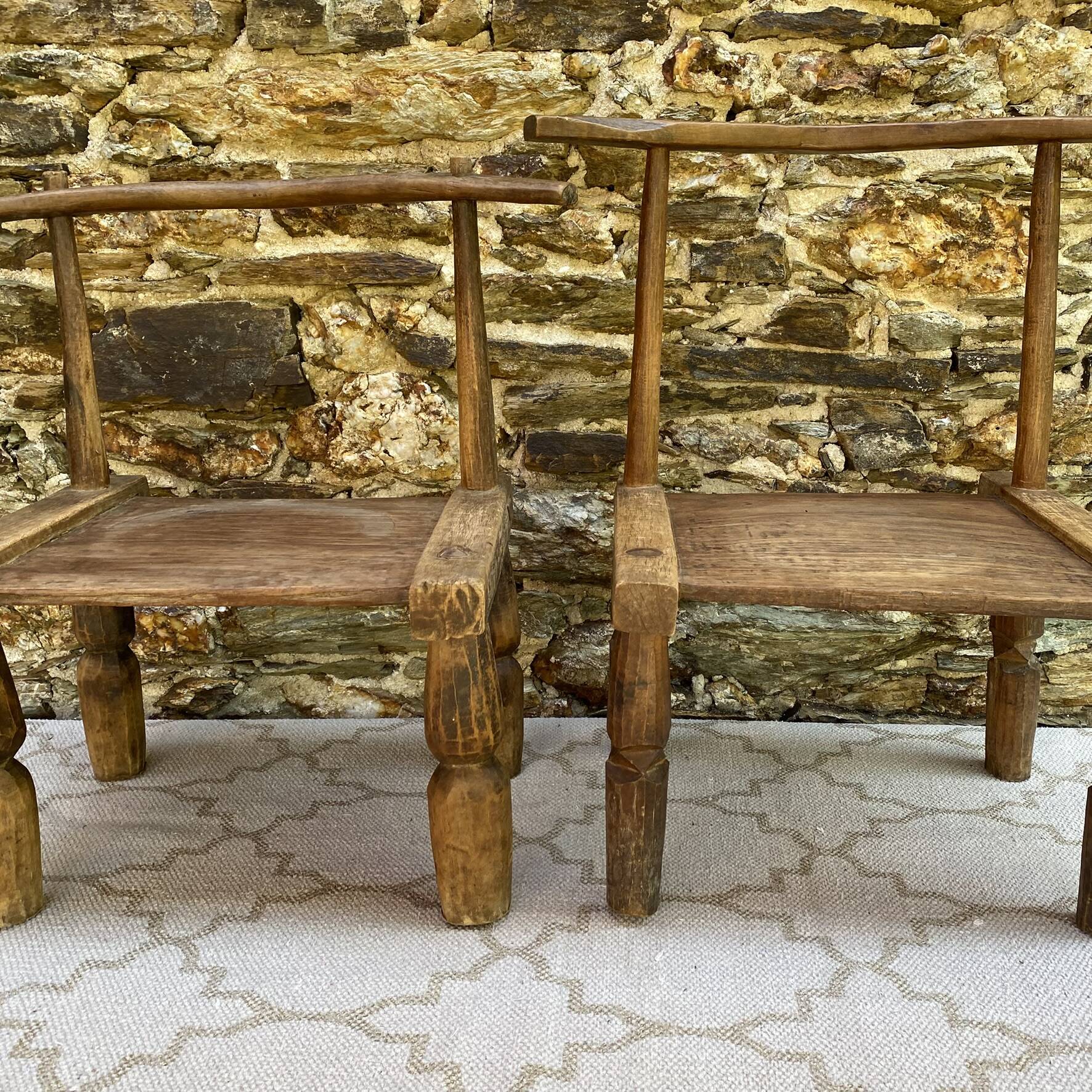 Ancient Baoulé African chairs in carved wood, Wabi-Sabi.
