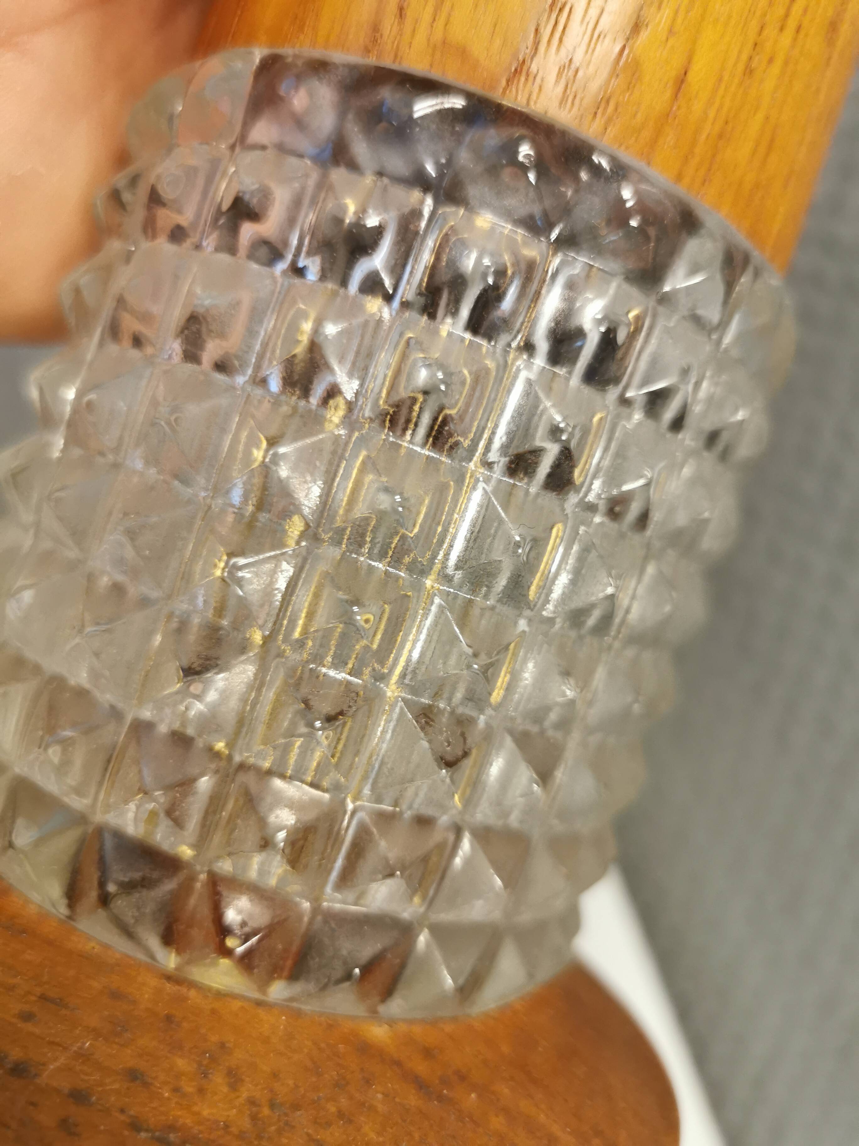 Swedish table lamps made of teak wood and hard pressed crystal glass.