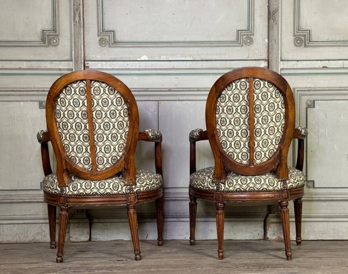 Pair Of Louis XVI Armchairs In Carved Wood, 18th Century