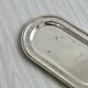 Small vintage oval tray in shiny lightweight metal