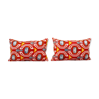 Set of two red ikat velvet lumbar pillows