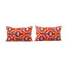 Set of two red ikat velvet lumbar pillows