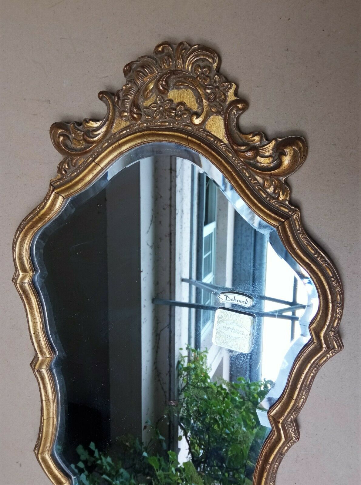 Golden wall mirror with gold leaf Deknudt - beveled ice - Louis XV style